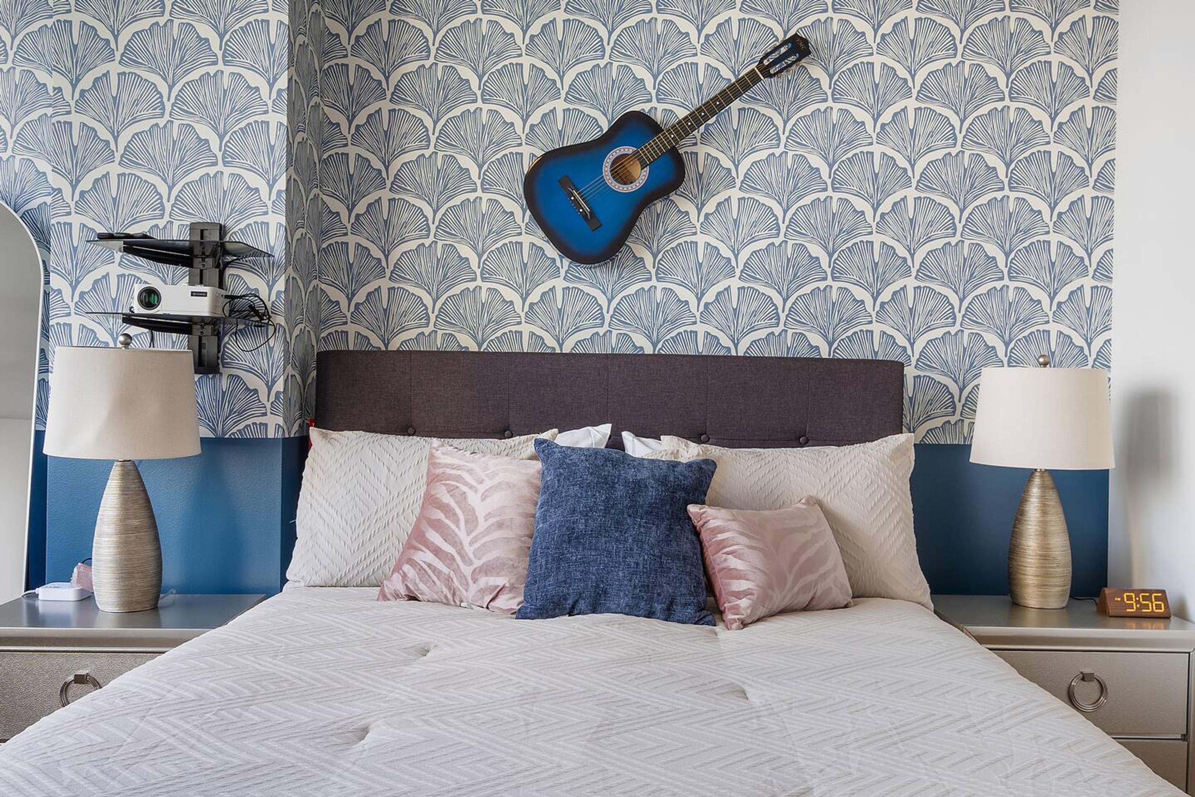 Bedroom with Queen size bed 
The lamp on left was cracked by one of our little guest but good to use
