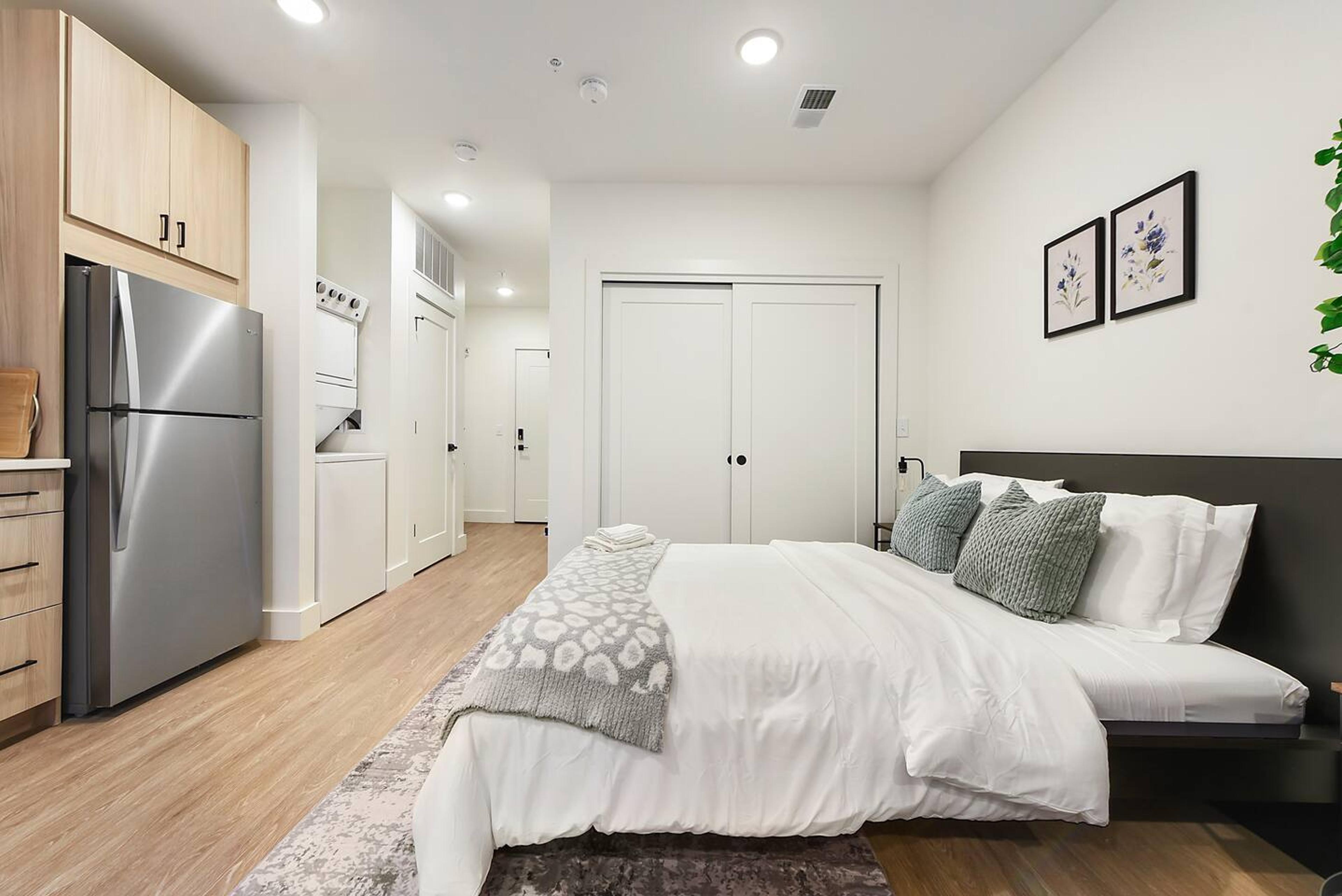 Comfy queen bed and plush, pillows for a restful night's sleep.