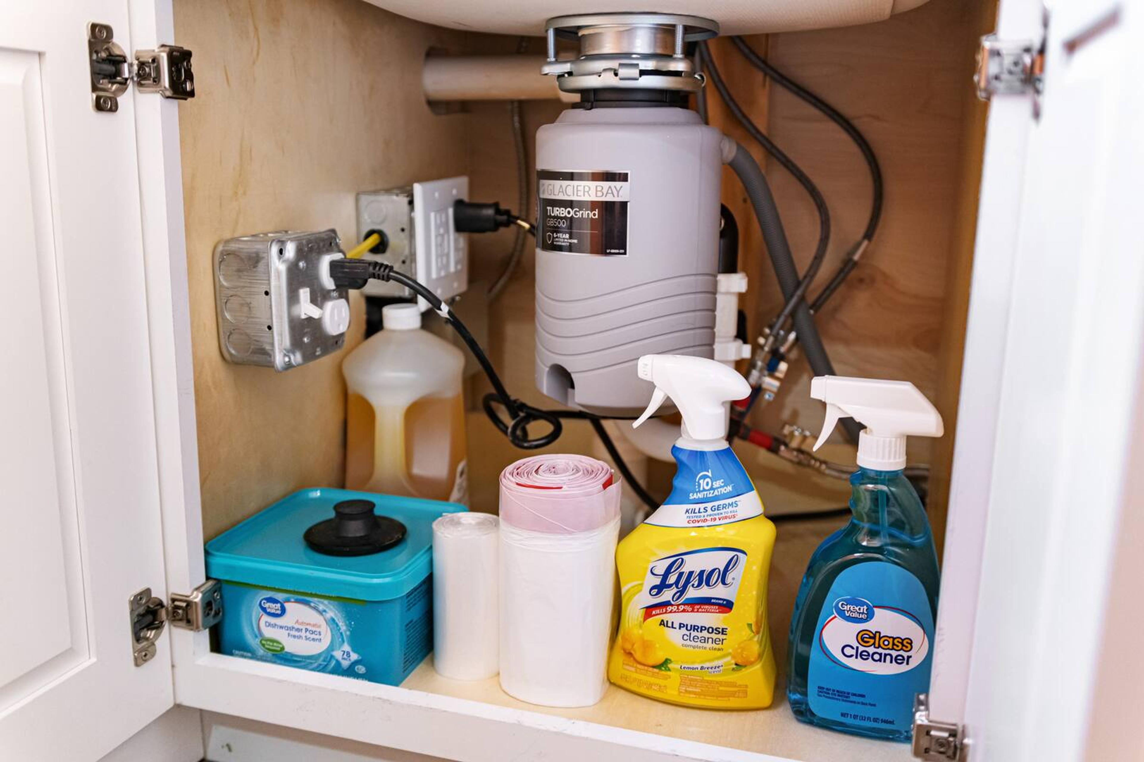 Sparkling clean and ready for action!  Our kitchen is stocked with all the essential cleaning items to keep everything tidy and fresh.