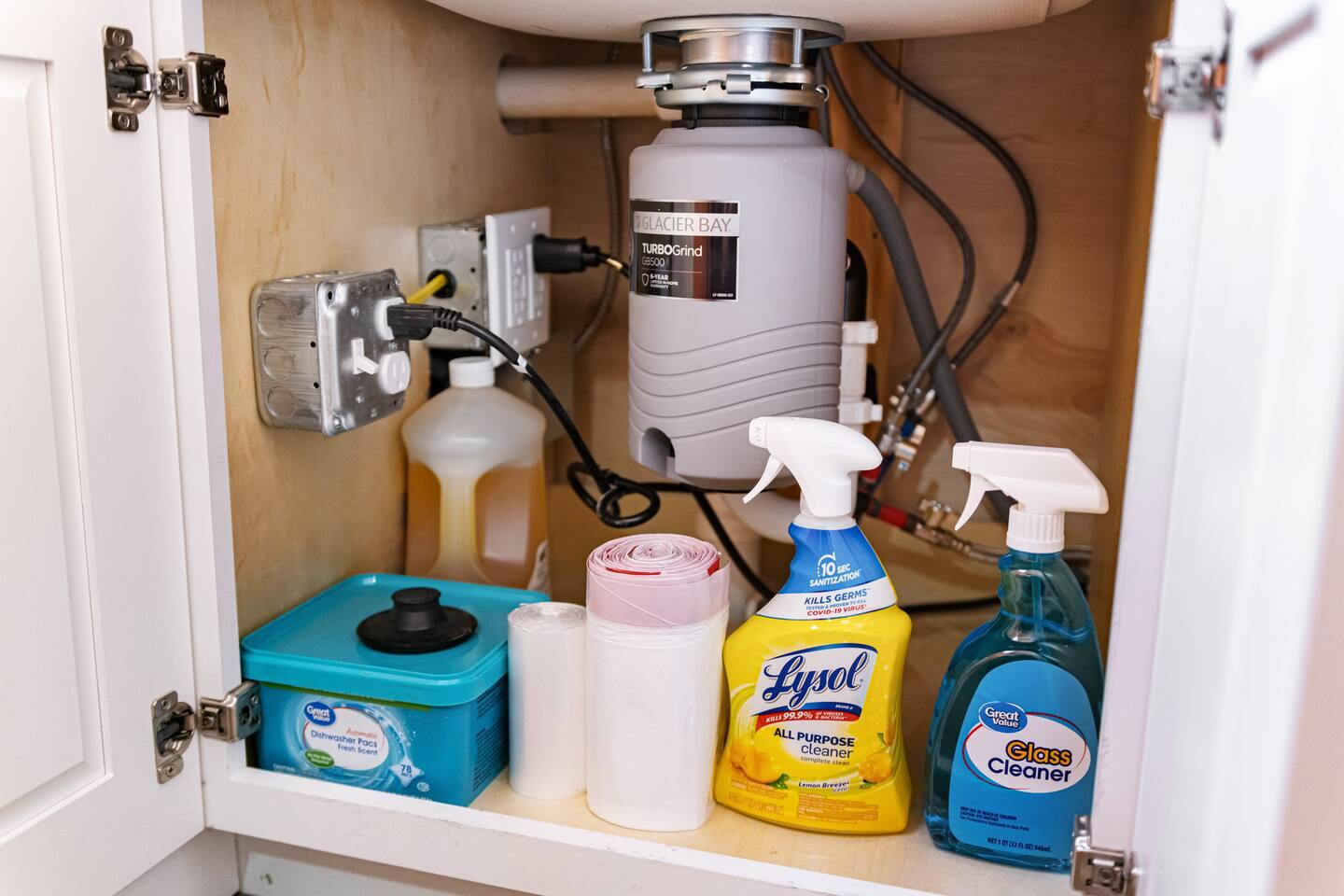 Sparkling clean and ready for action! Our kitchen is stocked with all the essential cleaning items to keep everything tidy and fresh.