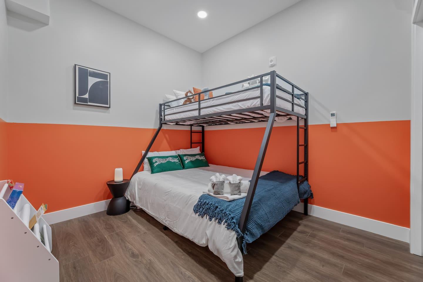 Bedroom 2: Bunk bed with Twin XL over Kind size bed.
Has: AC, books for kids, games, night light , blanket, pillows and night lamp.