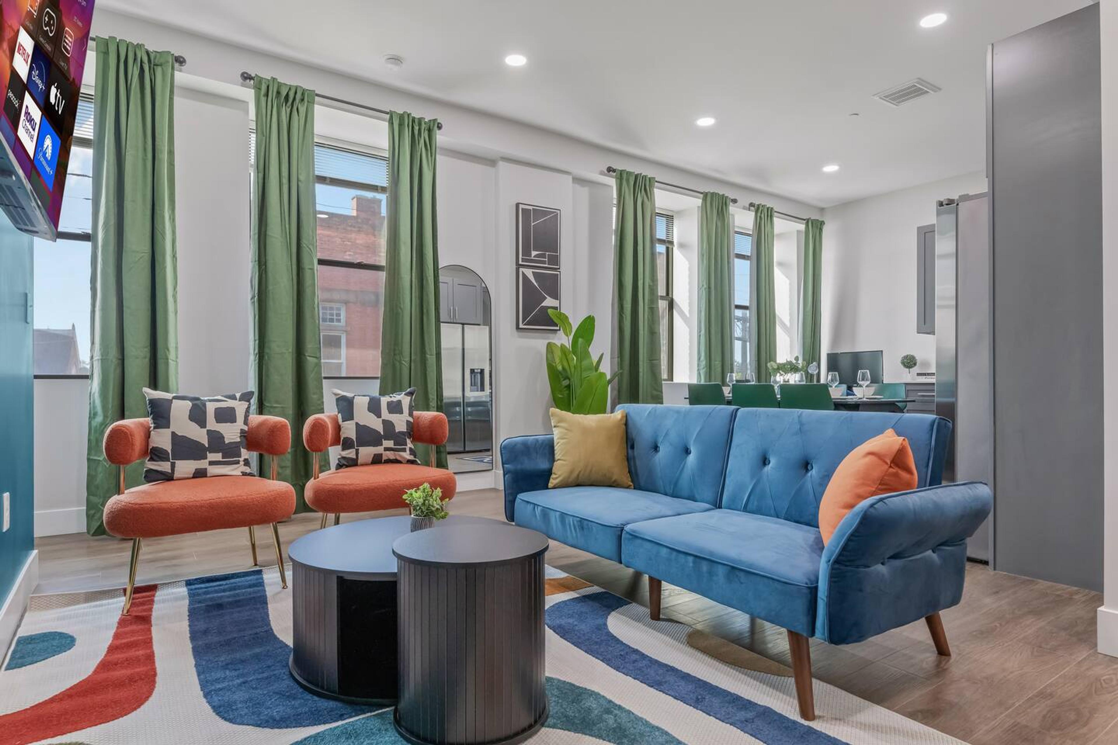 Living Room : Furnitures and wall art featuring a stunning look.