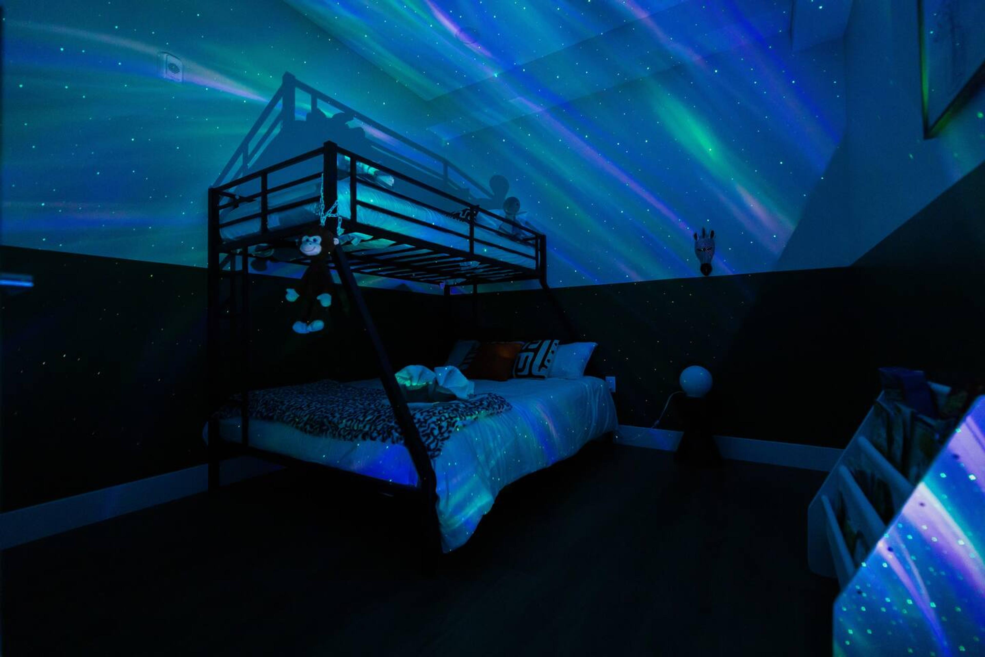 Bedroom 2: Bunk bed with Twin XL over Kind size bed. 
Has: AC, books for kids, games, night light , blanket, pillows and night lamp.