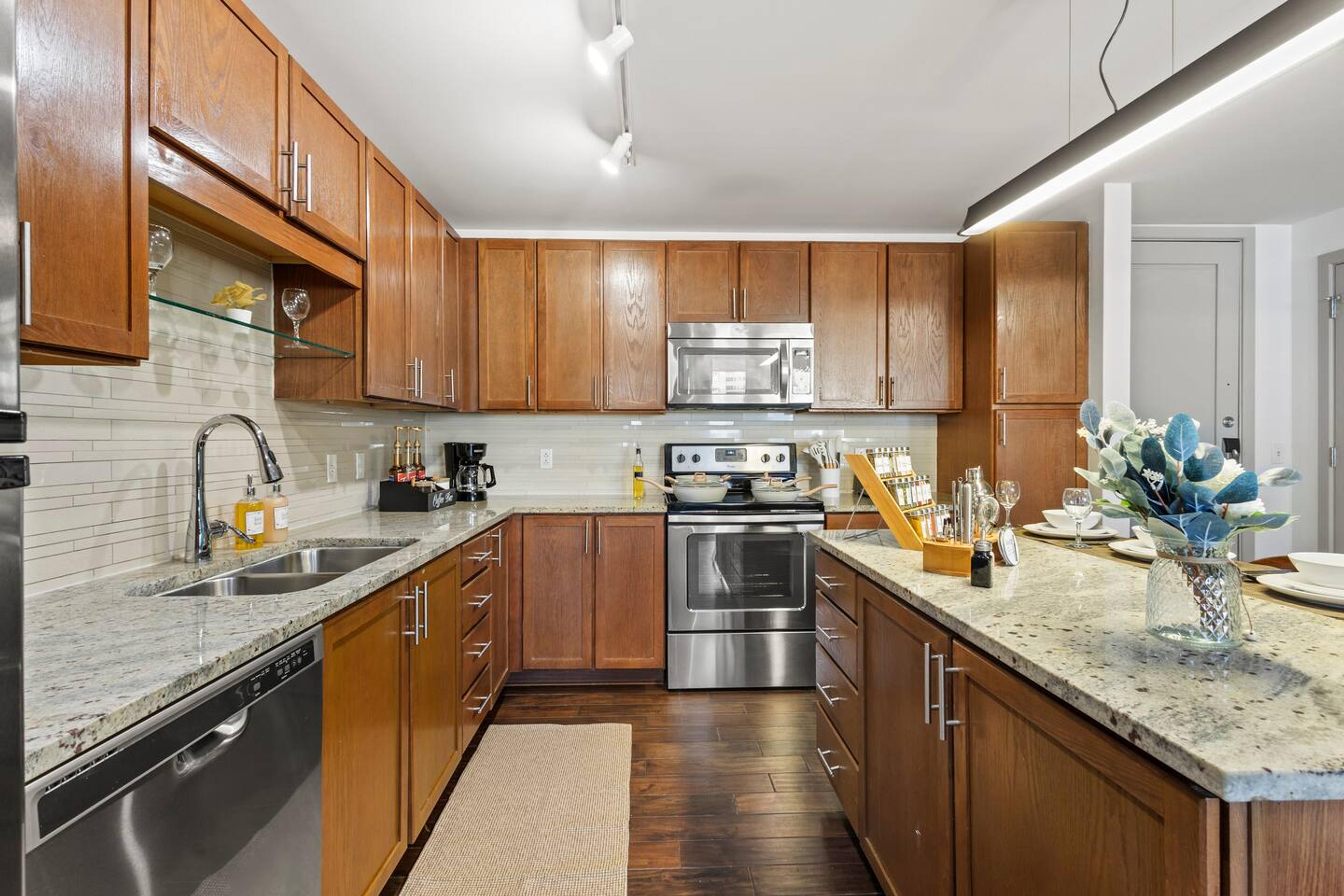 Kitchen
Fully equipped kitchen with microwave, stove, oven, refrigerator/freezer, dishwasher, toaster, sink with hot & cold water, trays, glasses, coffee, sugar, salt, olive oil, spices, silverware, pots and pans, coffee maker with essentials & more