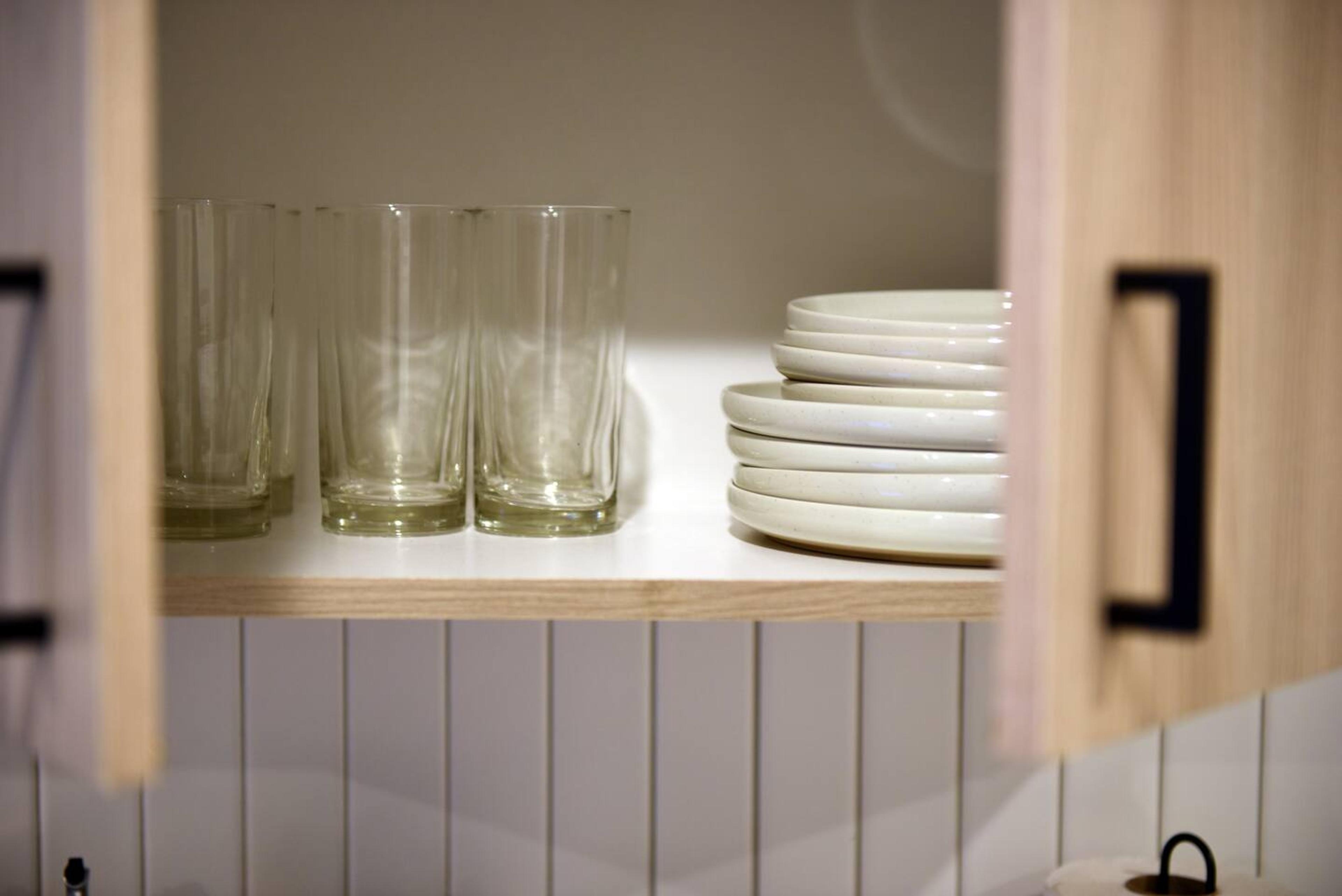 Complete dishes and utensils, ensuring you have everything you need for dining and meal preparation during your stay.