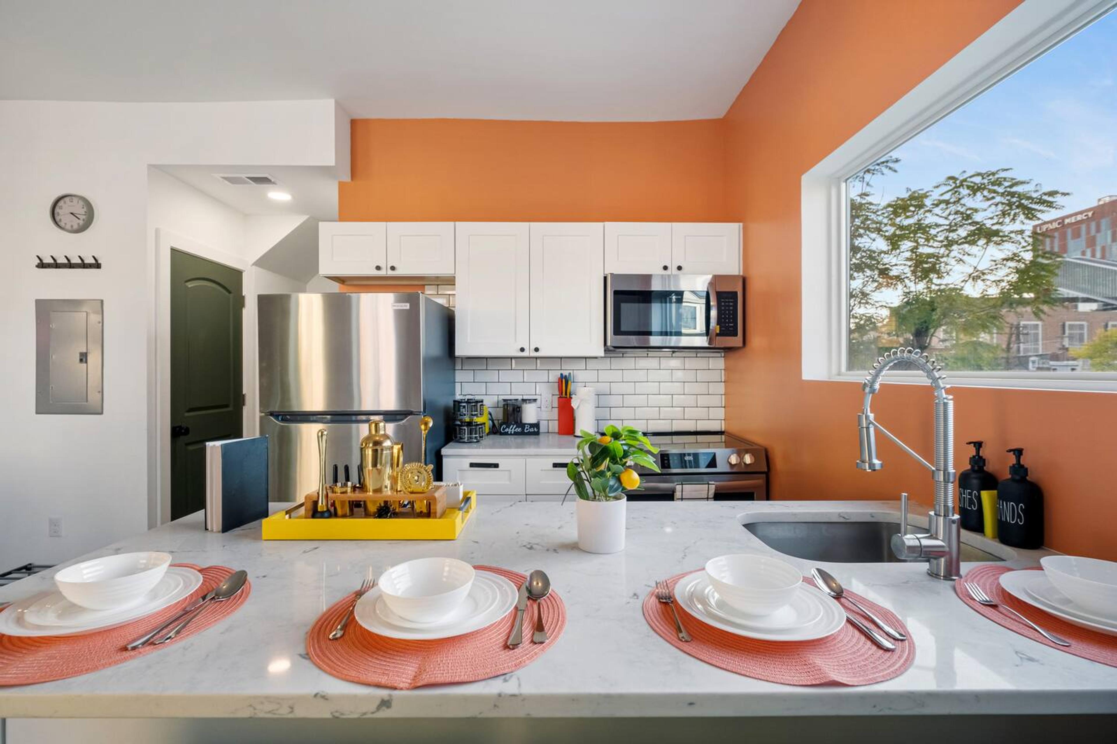 This dining room is perfect for entertaining. It has a large table that can seat 4 people comfortably with an attached sink. Also a cocktail mixer to find your hidden bartender skills!