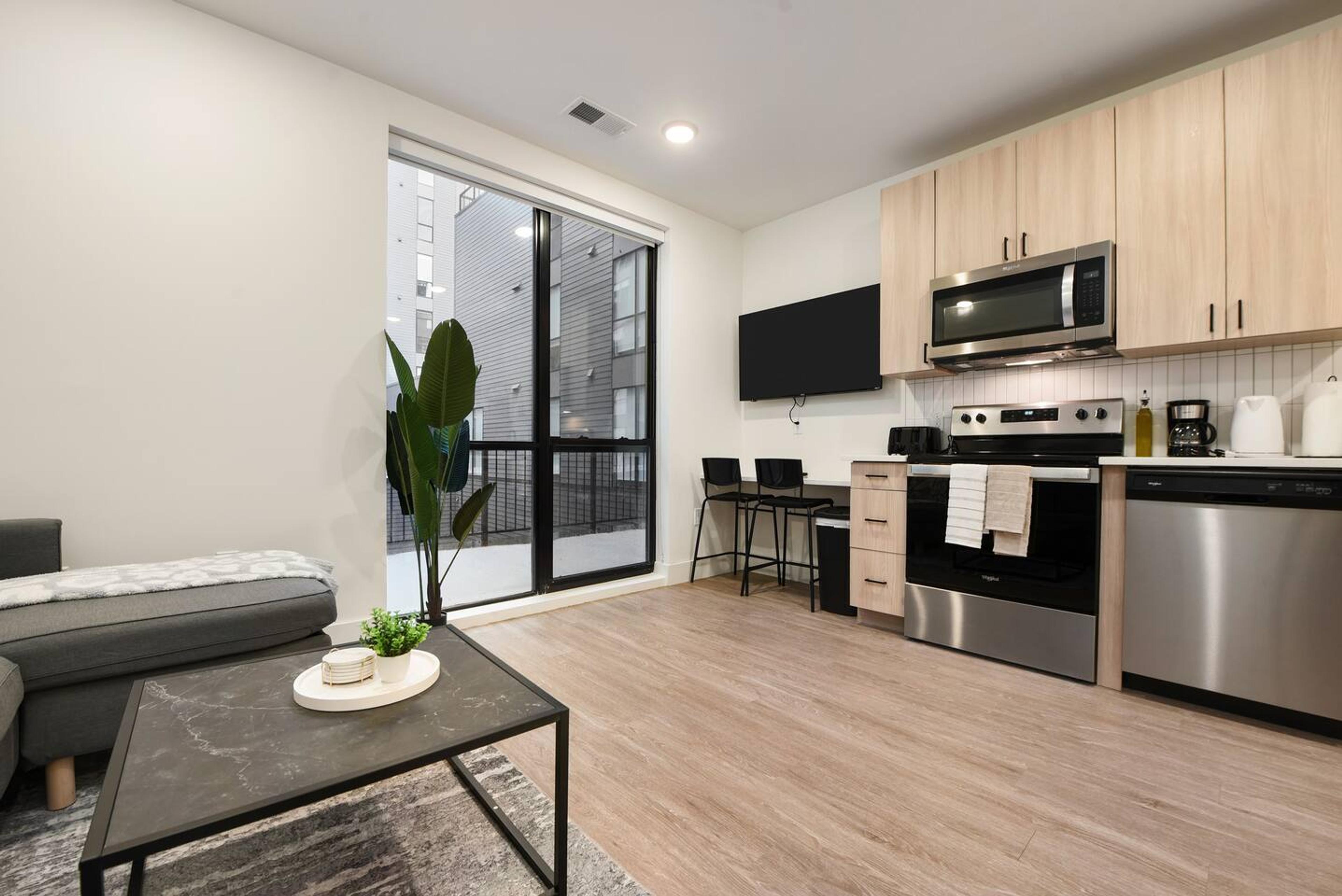 Bright, spacious kitchen perfect for cooking and dining. Fully equipped with everything you need for a comfortable stay.