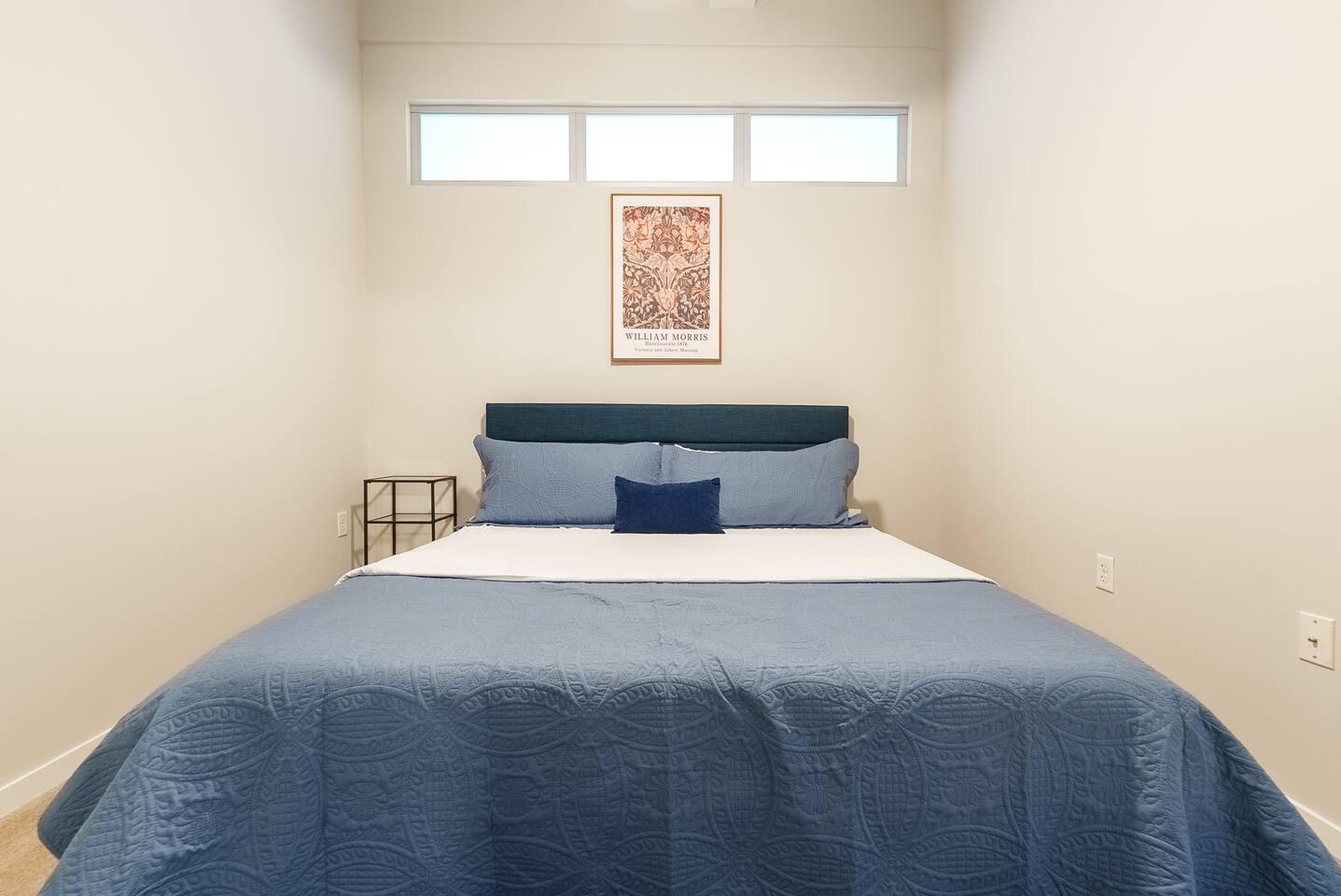 Comfortable king-size bed with fresh linens for a restful stay.