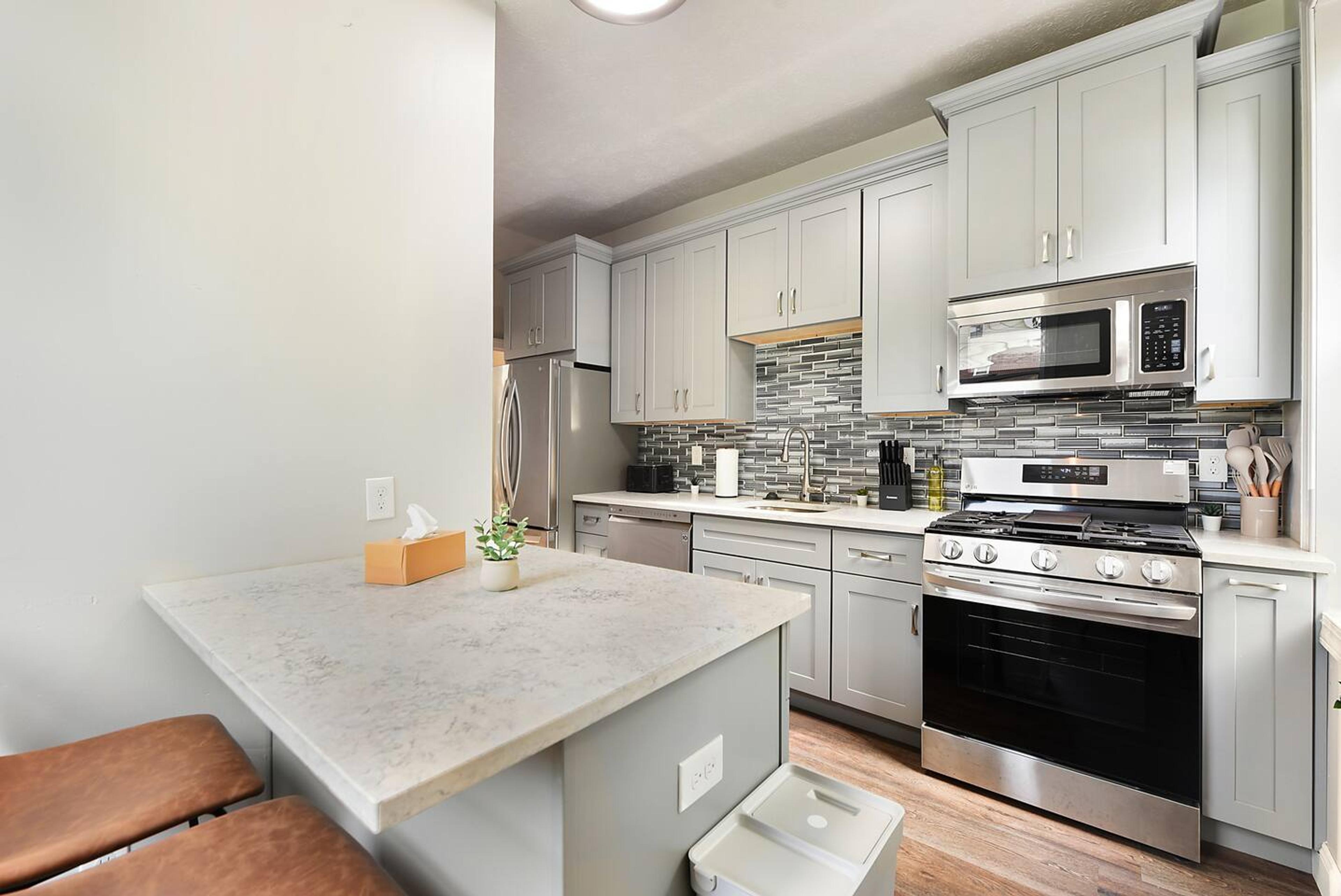 Discover the Heart of Home in Our Fully Equipped Kitchen and Inviting Dining Area