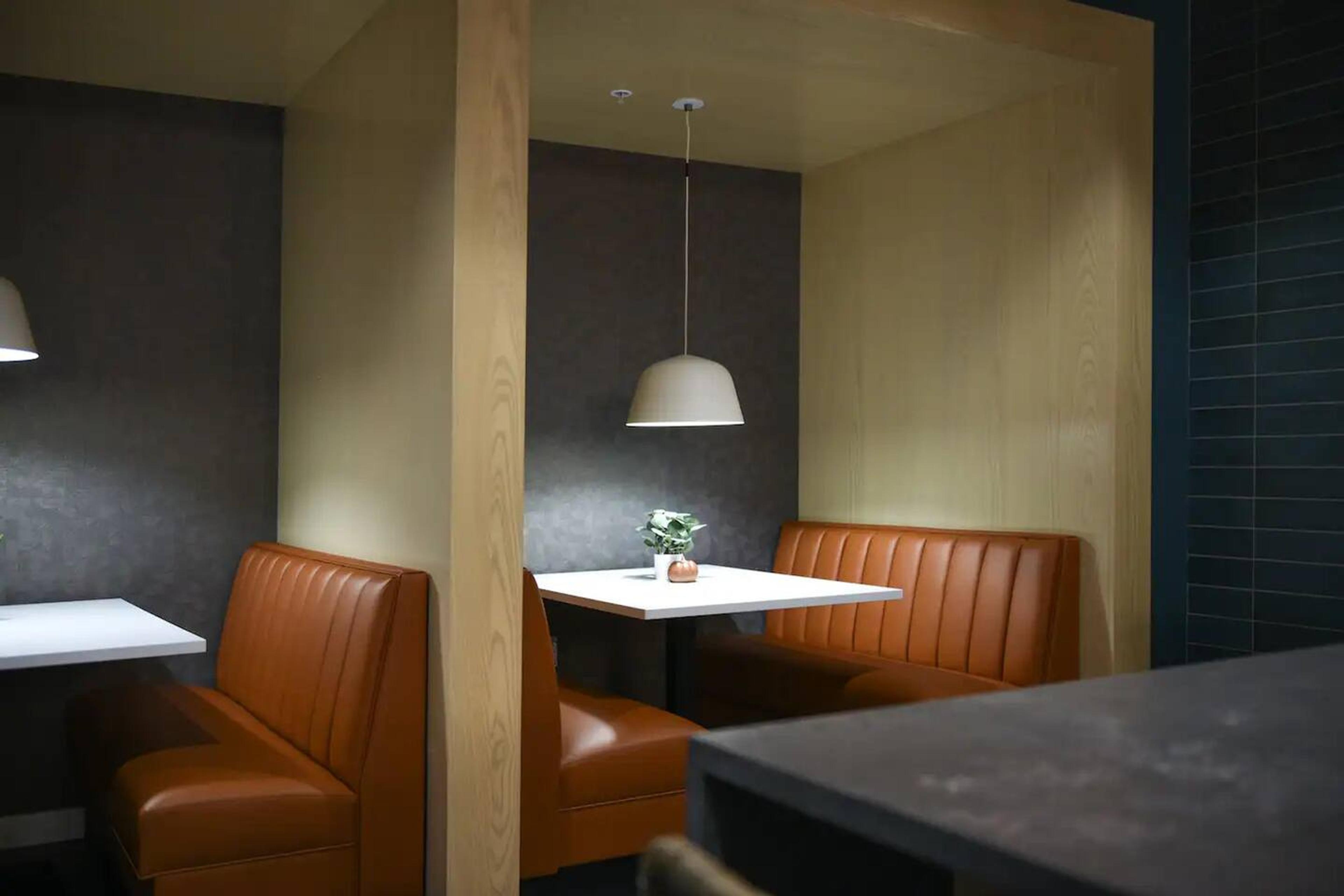 Cozy dining area perfect for enjoying meals together, designed with comfort and convenience in mind for your stay.
