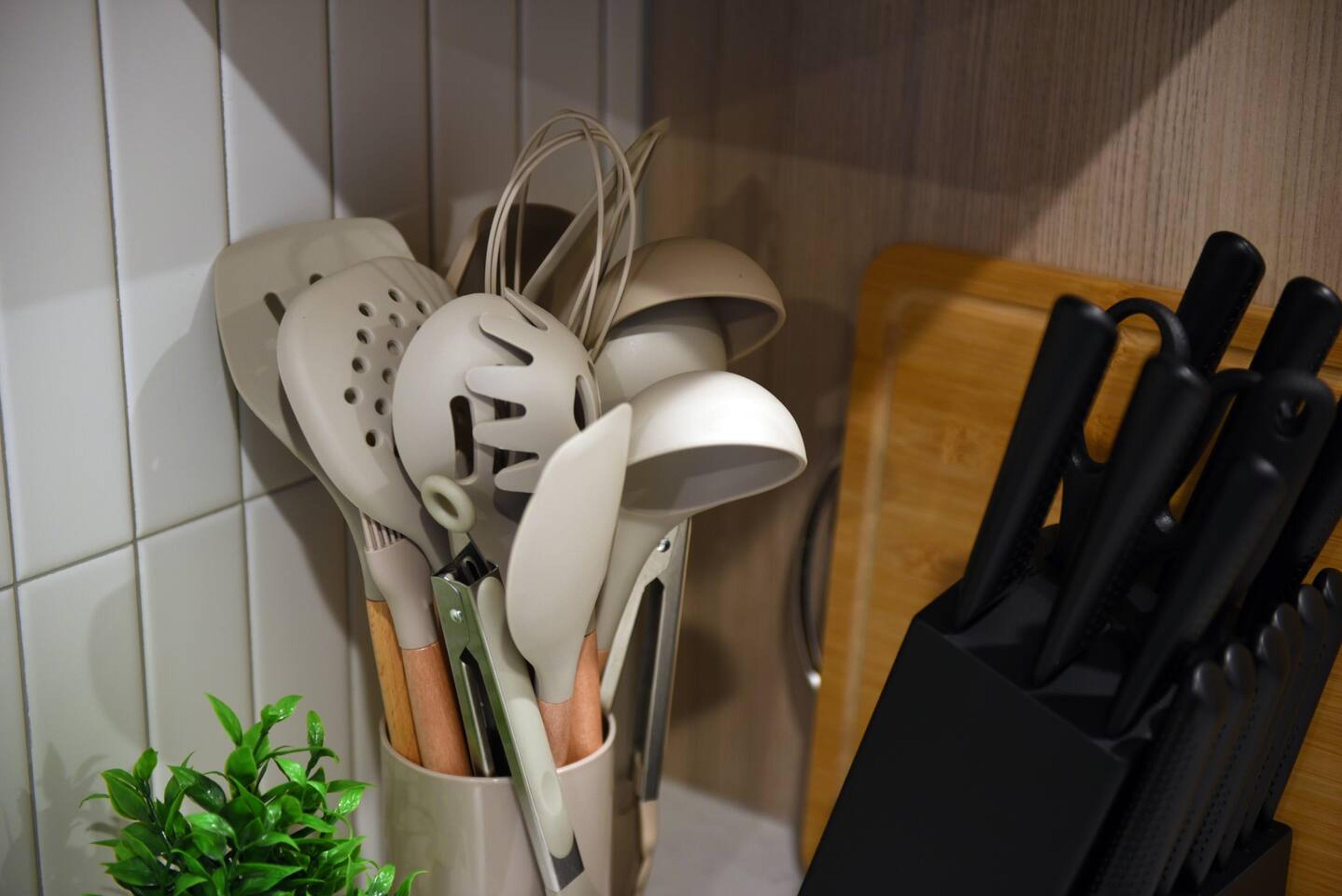 Complete dishes and utensils, ensuring you have everything you need for dining and meal preparation during your stay.