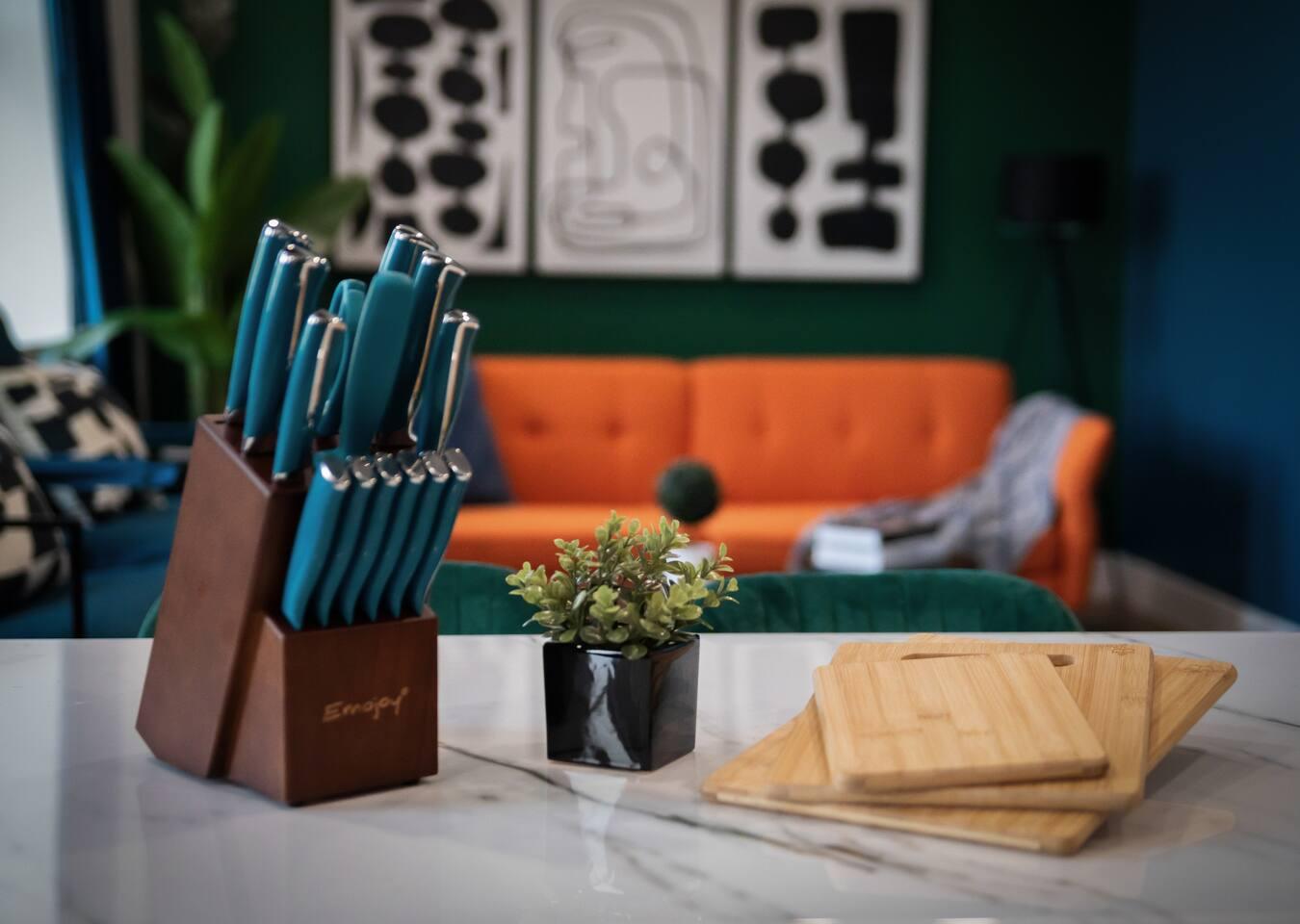Kitchen Items: Knife set and cutting boards.