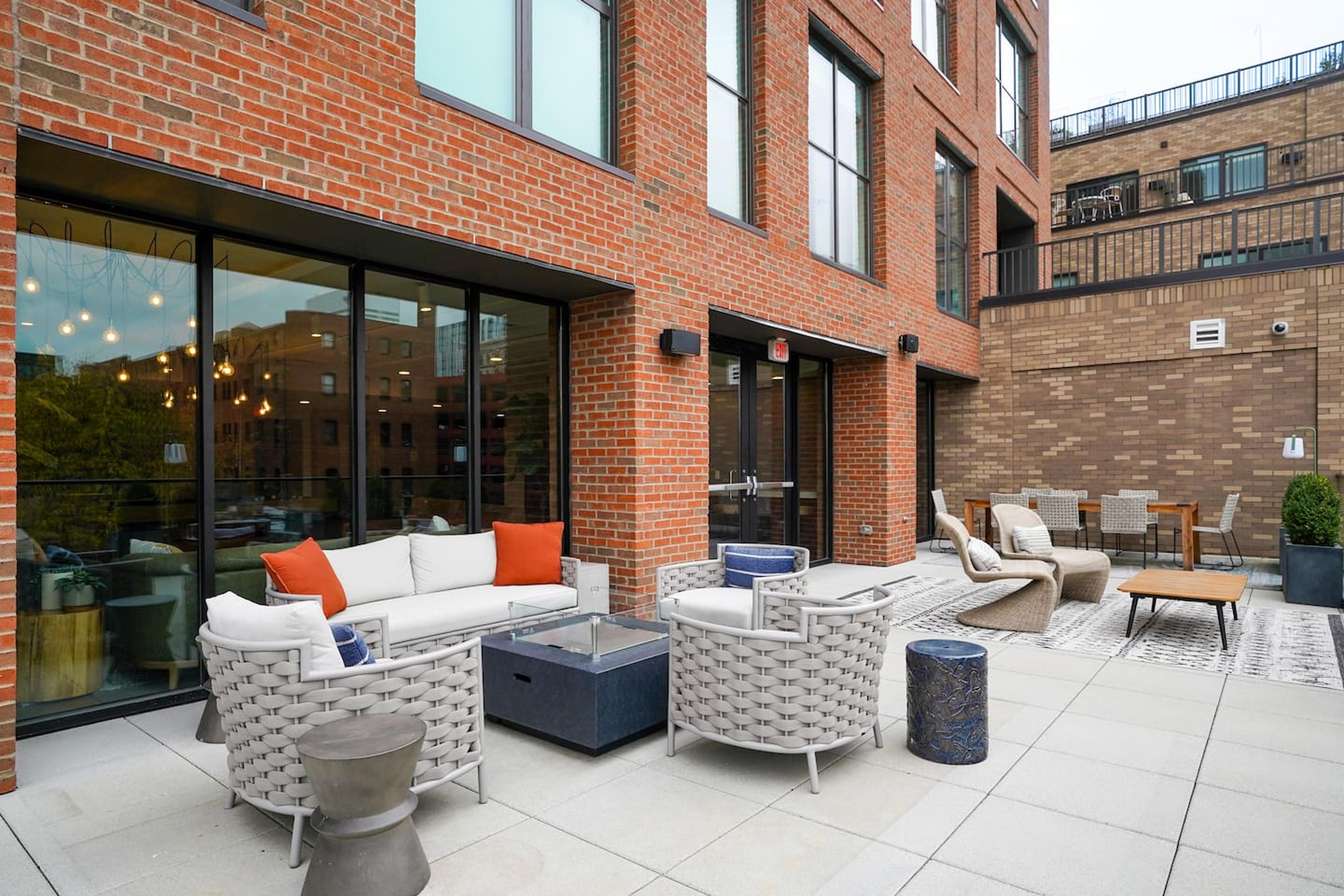 Bask in the enchanting ambiance of our beautiful patio, where timeless elegance meets nature's tranquility in a symphony of outdoor luxury !