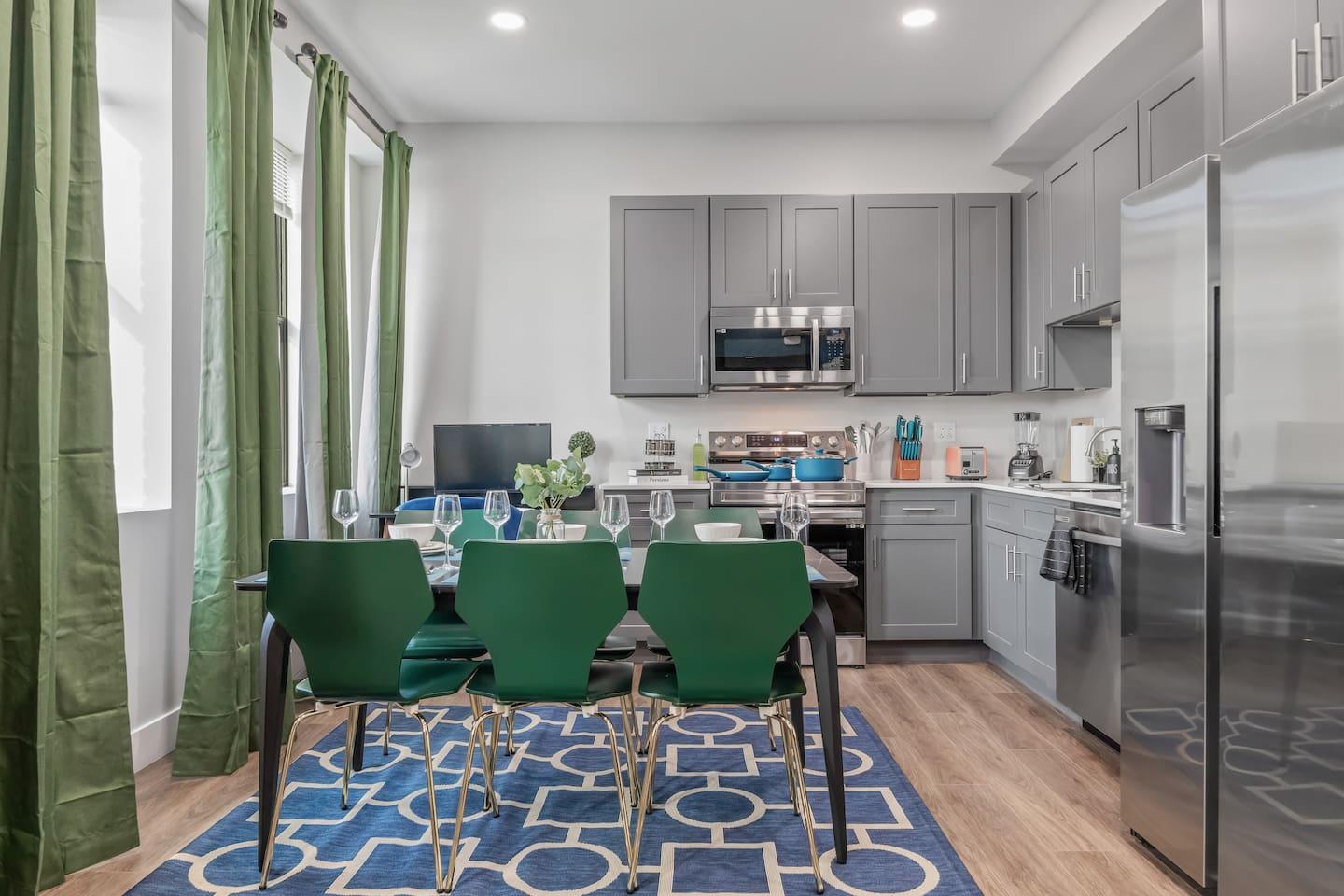 This dining room is perfect for entertaining. It has a large table that can seat six people comfortably.