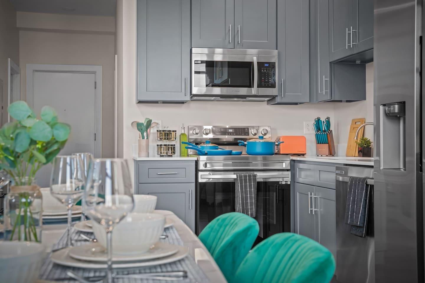 A classic dining room provided with amenities like different cooking cutlery sets, dining plates, glassware and etc. We also have an microwave and an oven for your use