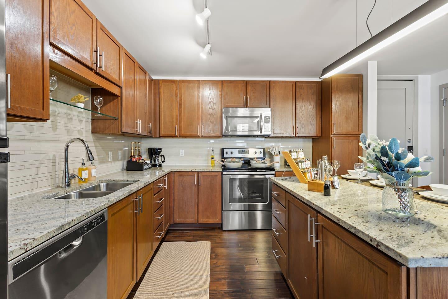 Kitchen
Fully equipped kitchen with microwave, stove, oven, refrigerator/freezer, dishwasher, toaster, sink with hot & cold water, trays, glasses, coffee, sugar, salt, olive oil, spices, silverware, pots and pans, coffee maker with essentials & more