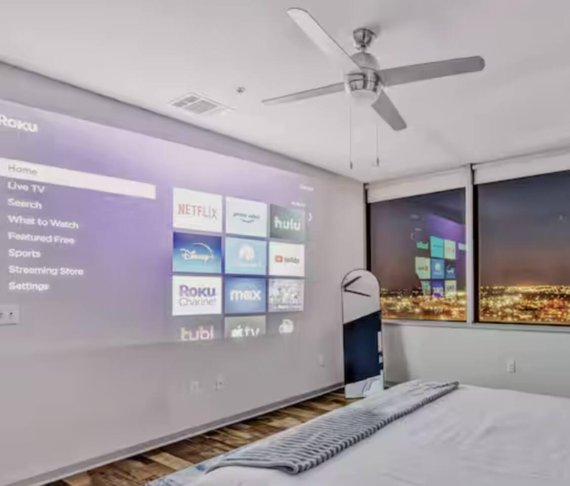 Bedroom 1: Has a movie projector ( Room with Guitar)