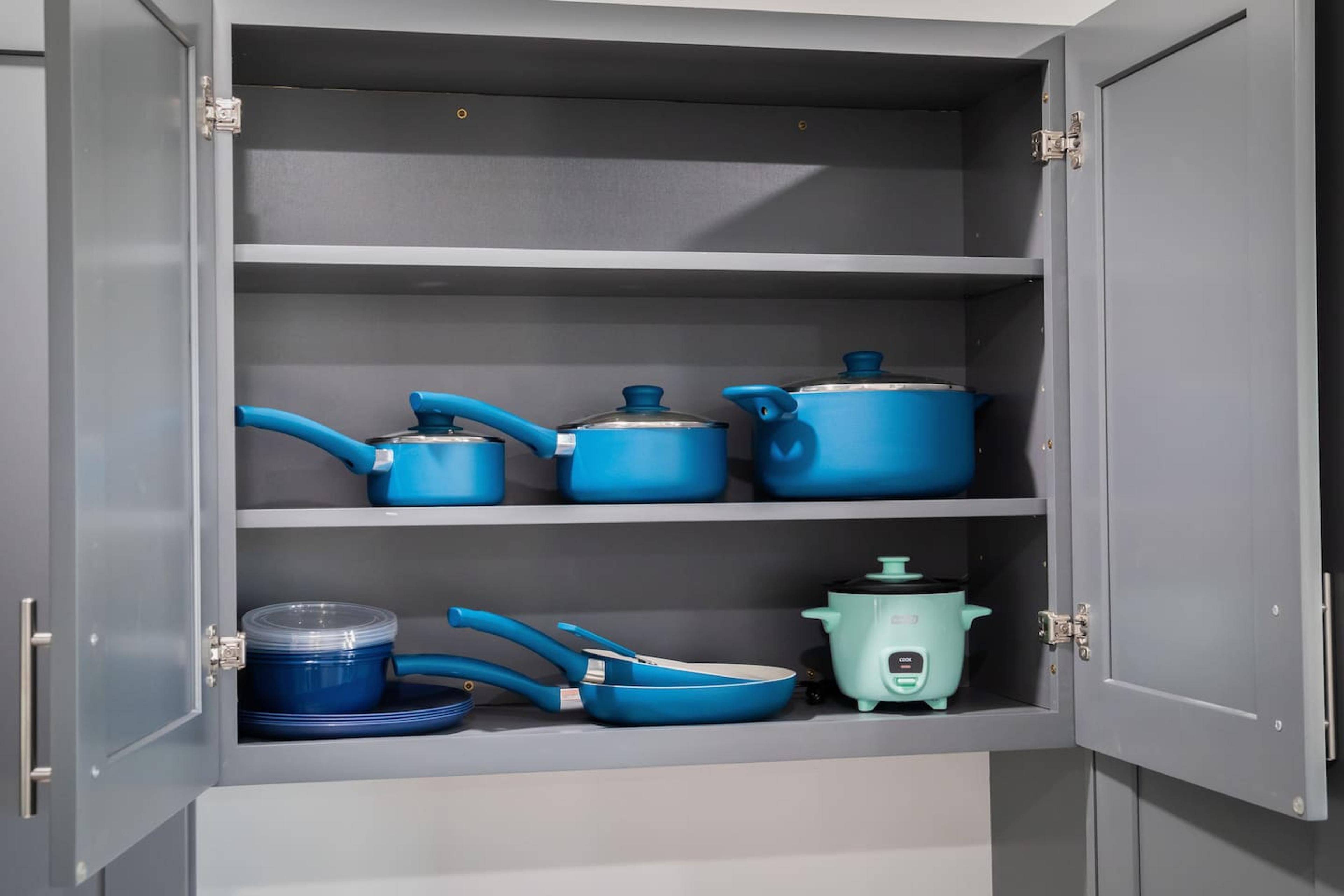 Pots,  pans , mini rice cooker and some storage boxes for you to use during your stay