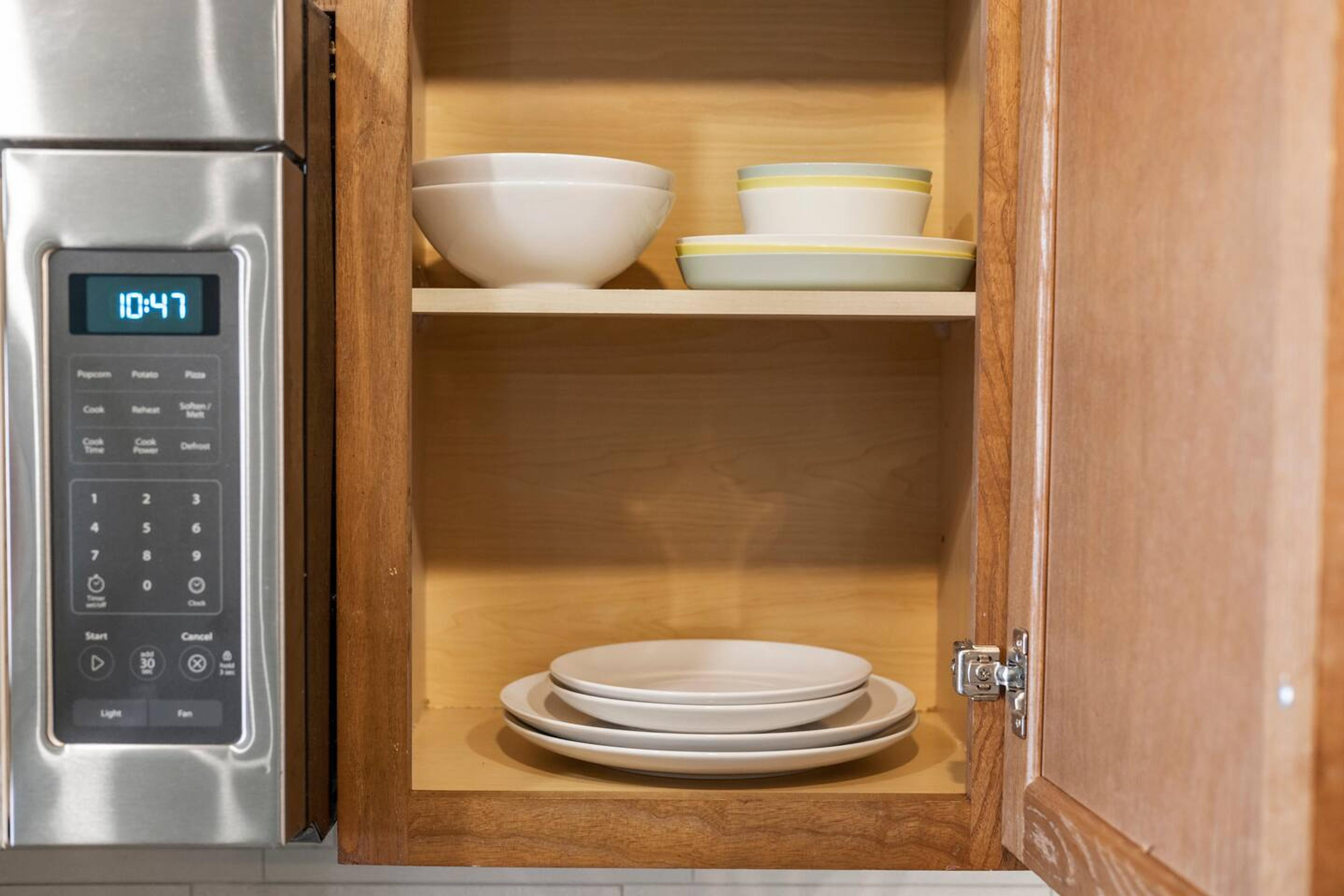cups and plates in the kitchen racks.