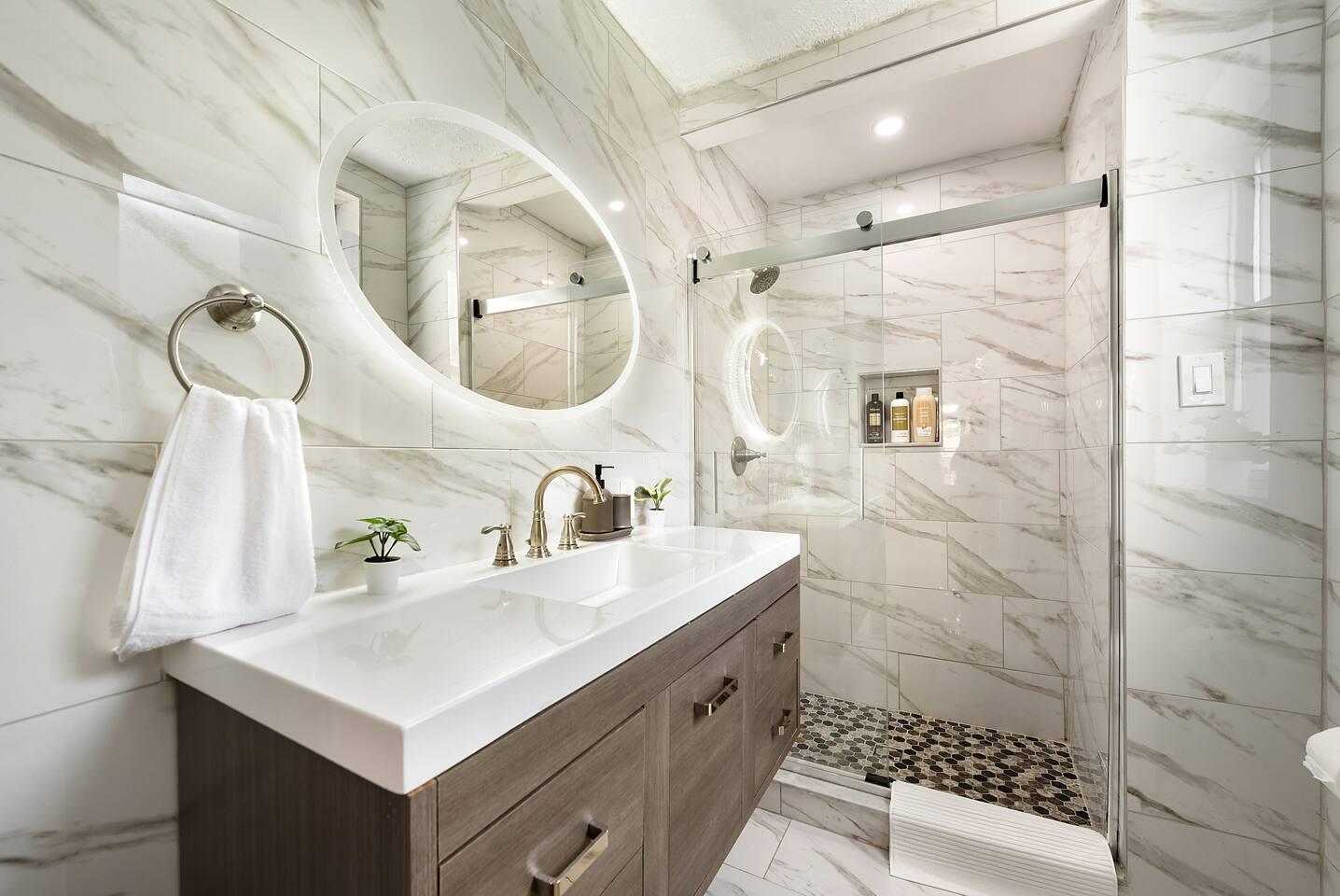 Bathroom 1: Step into a World of Opulence in Our Fully Equipped Bathroom with Gleaming Mirrors and Brilliant Lights