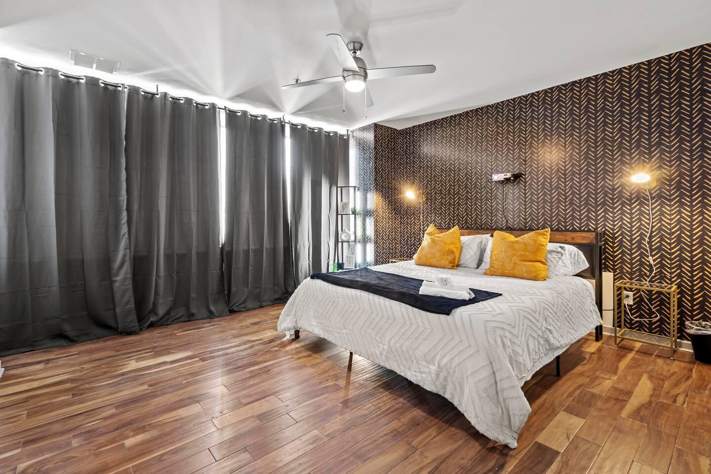 Bedroom
Spacious and beautiful room with a king-size bed, premium linens, and a movie projector.