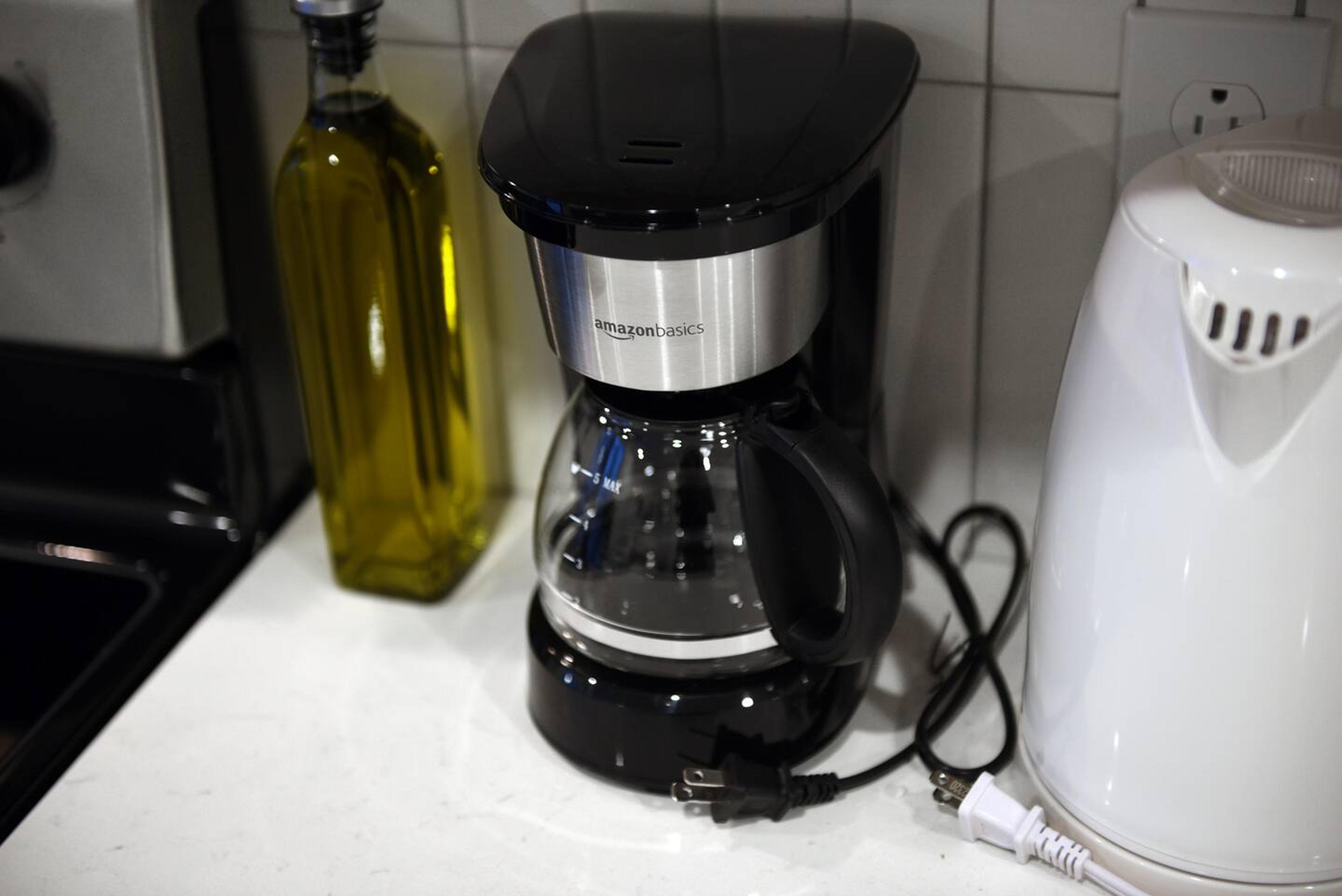Coffee maker with filters provided for your convenience, ensuring you can enjoy freshly brewed coffee during your stay.