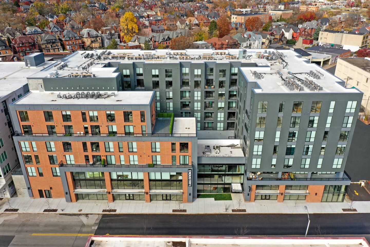 Exterior view of the building, showcasing its modern architecture and welcoming ambiance, ideal for your stay in Pittsburgh.