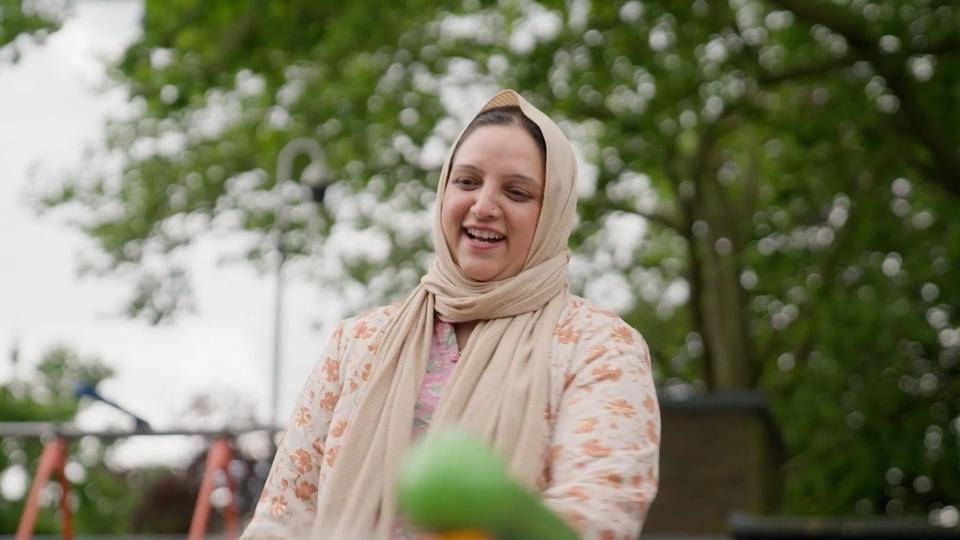 Saiqa at the park with her daughter