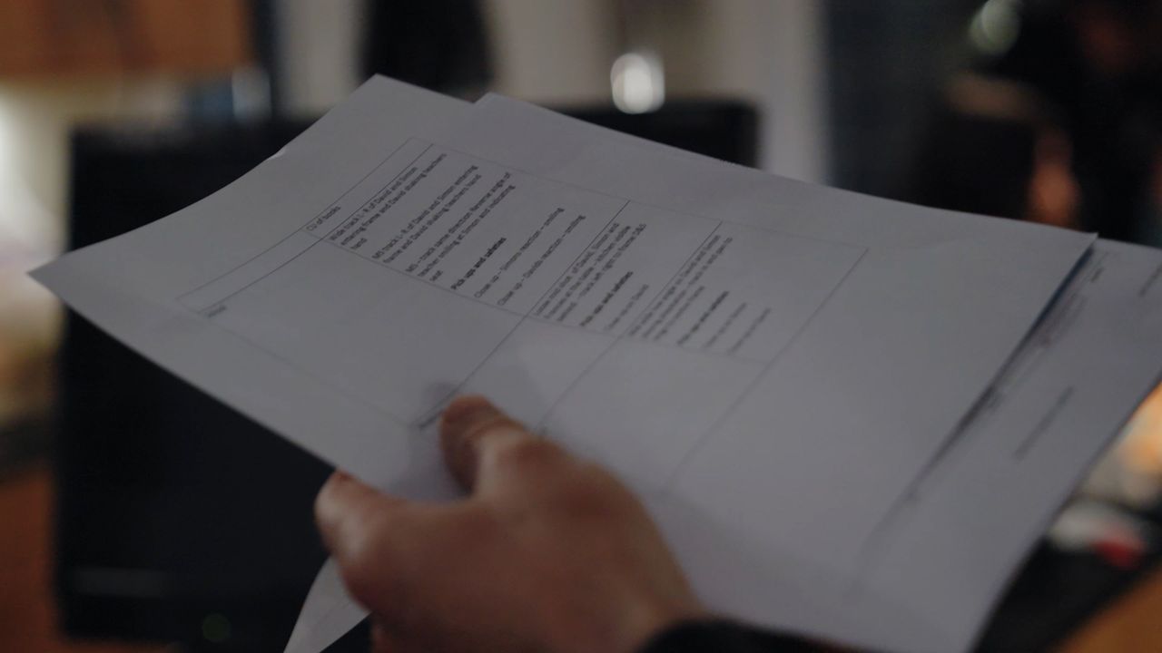 Director on set holding the script