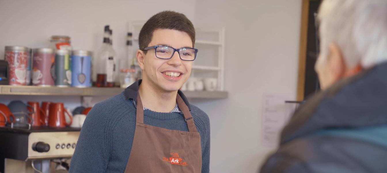 Young adult serving at coffee shop Young adult serving at coffee shop