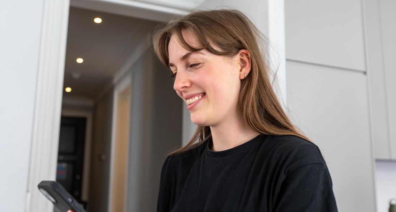 Producer looking at phone