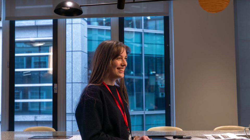 Producer smiling standing in shot