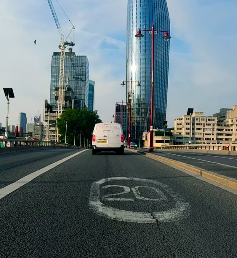 Pink Hygiene Van driving through London