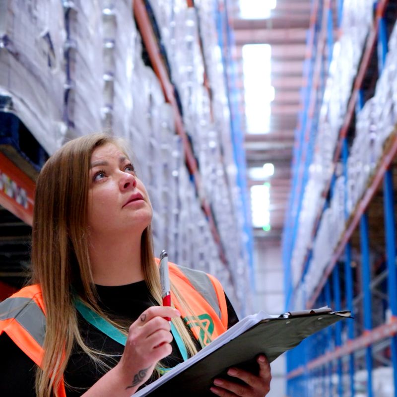 Warehouse worker checking stock