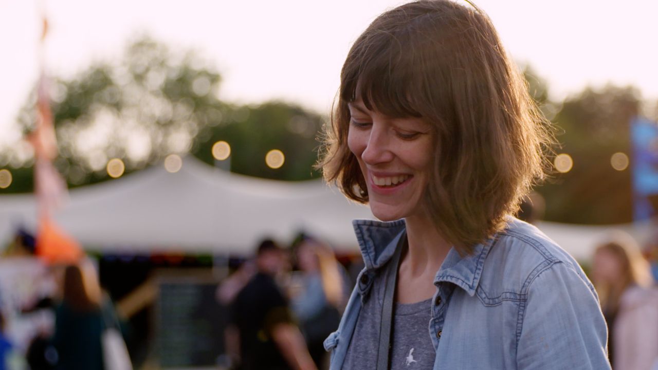 Lady smiling at the KPMG Big Tent Festival 