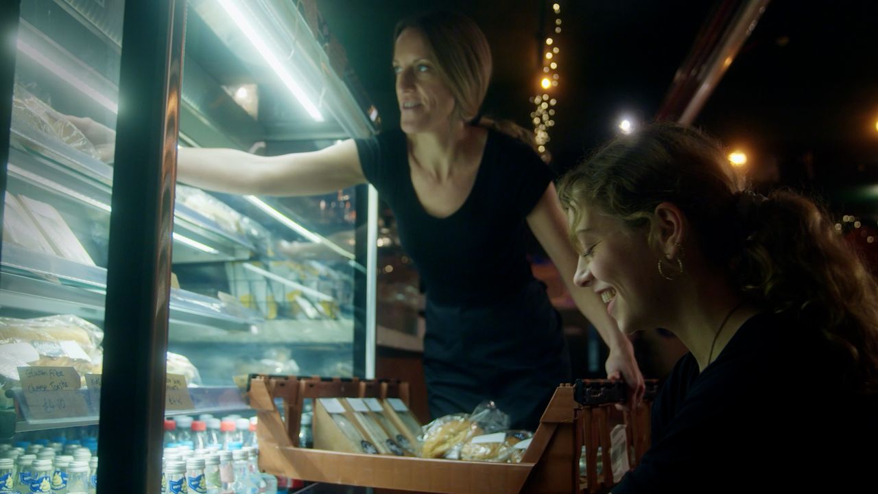 women stocking sandwiches 