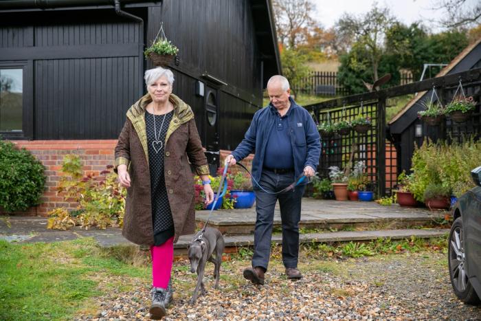 Chris and Lynne taking the dog for a walk