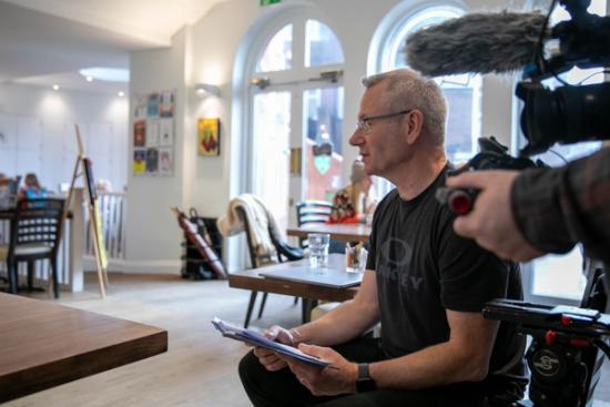 director asking participants interview questions