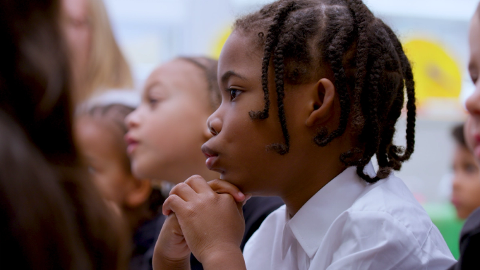 a child engaged in the lesson