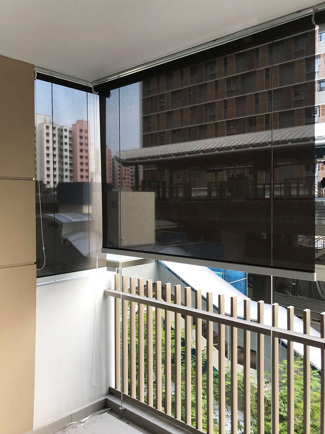 Outdoor roller blinds in an apartment balcony