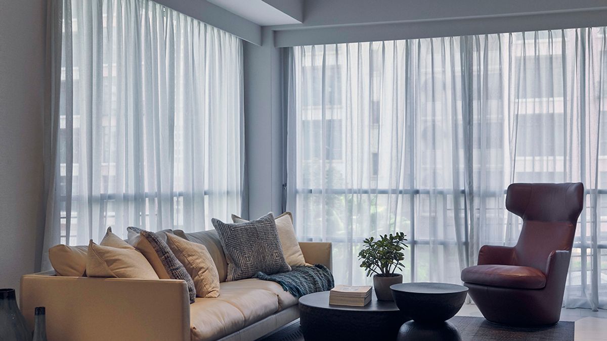 Sheer day curtains in a condo living room