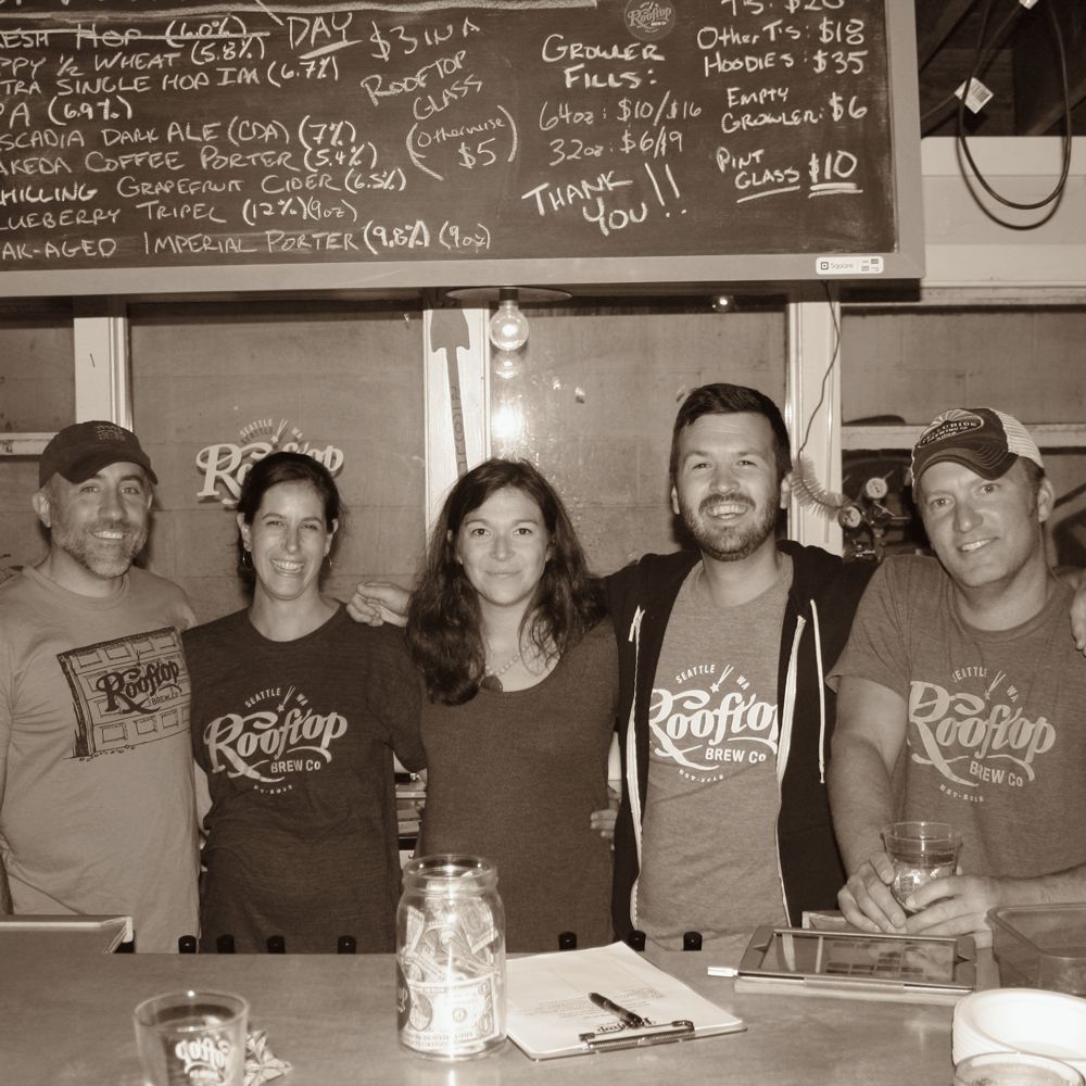 The founding Rooftop crew behind the bar