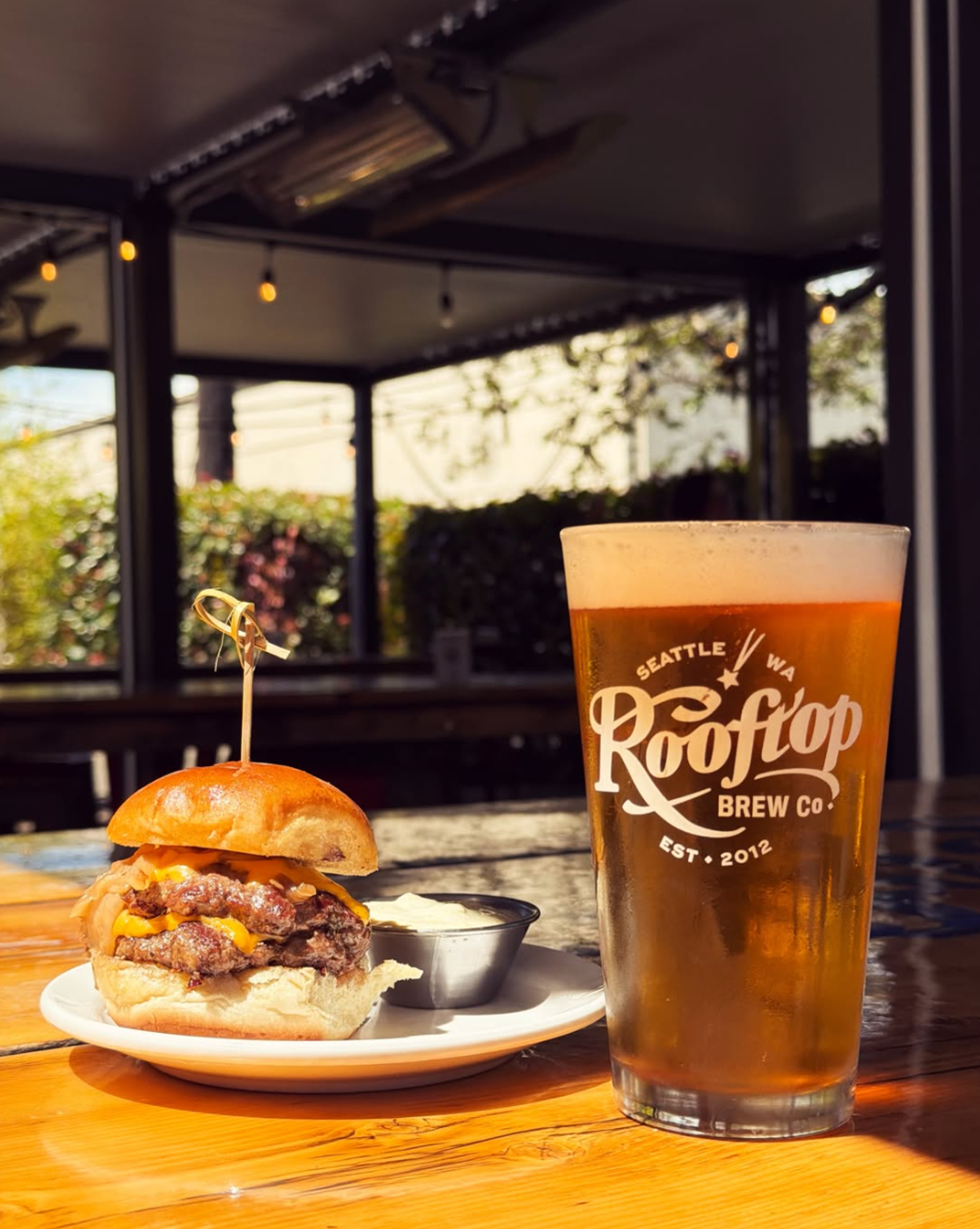 A slider and beer on the Jolly Roger patio
