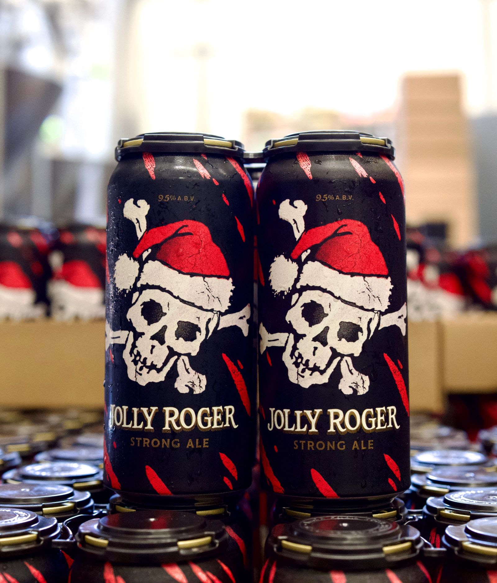 Cans of Jolly Roger Strong Ale