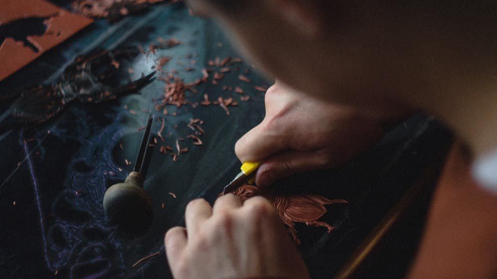 Photo of a craftsperson building something