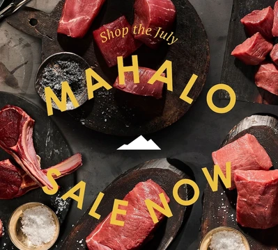 Maui Nui fresh cuts of venison laid out over a black table