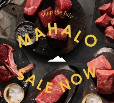 Maui Nui fresh cuts of venison laid out over a black table
