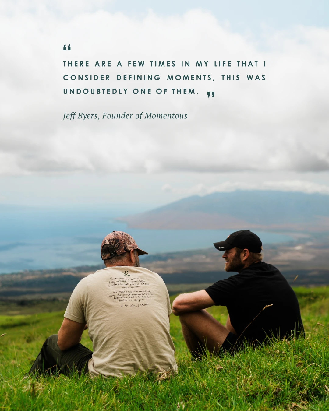 Jeff Byers of Momentous and Jake Muise of Maui Nui sitting hillside on the island of Maui