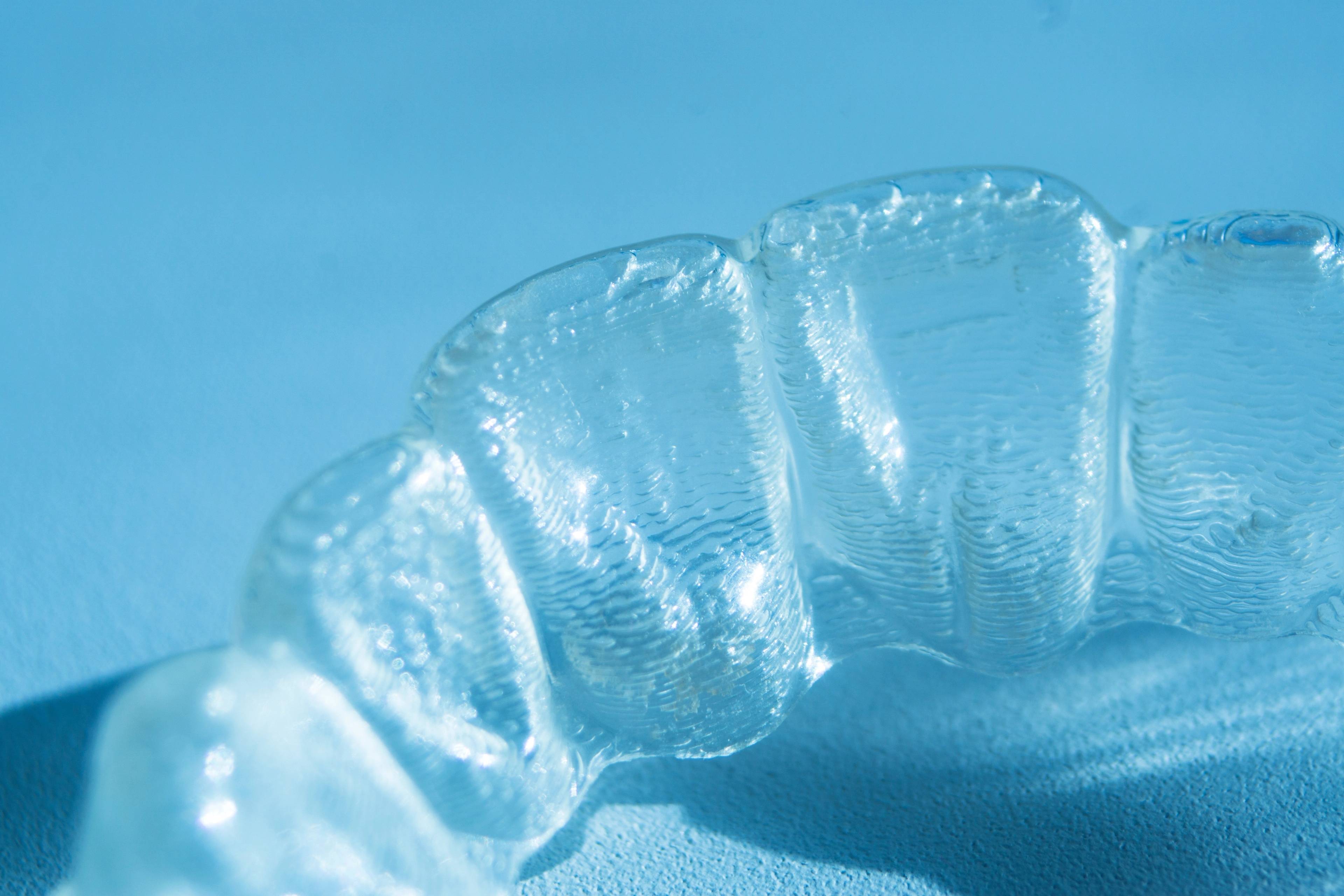 Invisalign clear braces on show