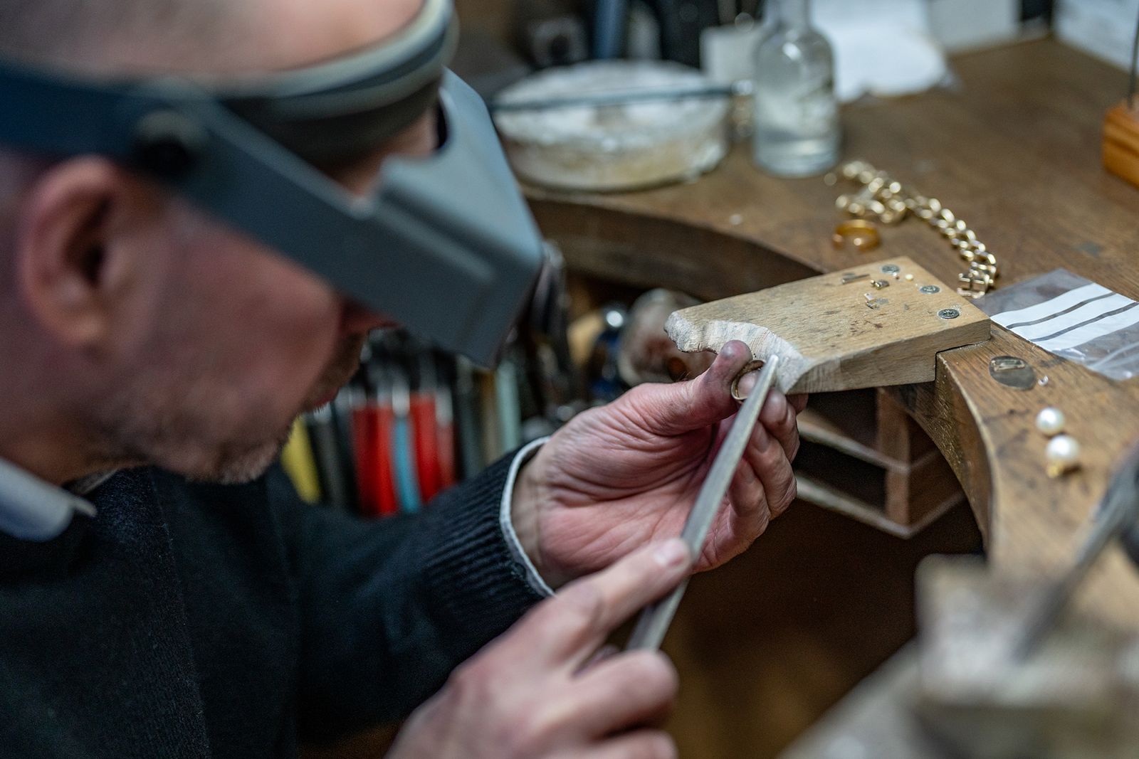 Craft worker making jewellery